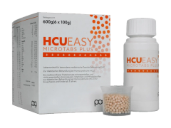 HCU Easy Microtabs Plus packaging, bottle and microtabs in measuring cup.