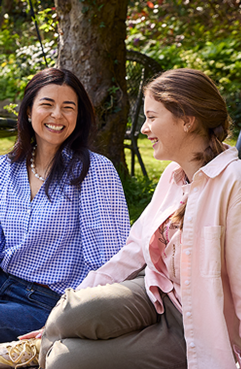woman and daughter laughing