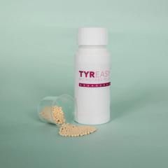 Bottle of TYR Easy Microtabs. Microtabs in measuring cup spilling out. 