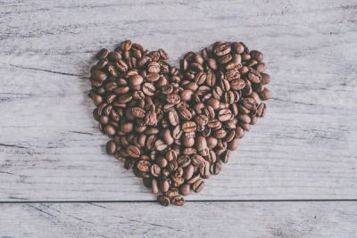 Picture of Coffee beans arranged in shape of heart symbol