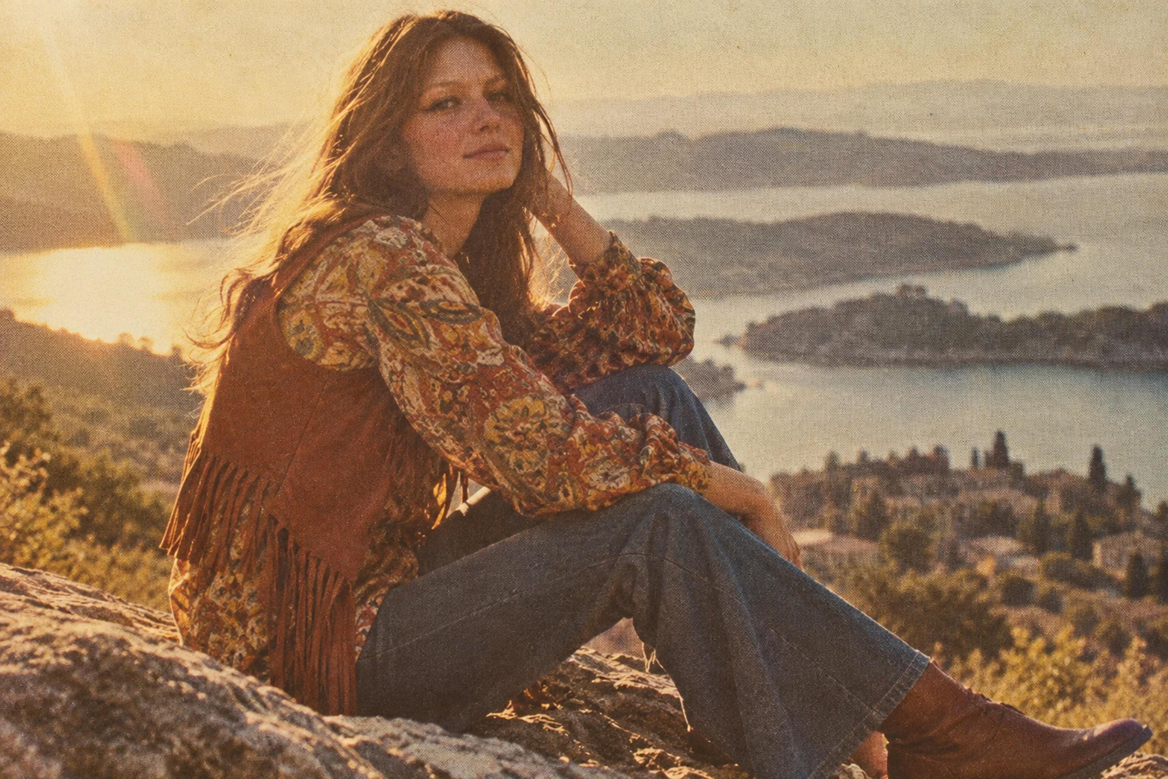 1970s-style fashion portrait in rust, mustard and olive under golden sunlight