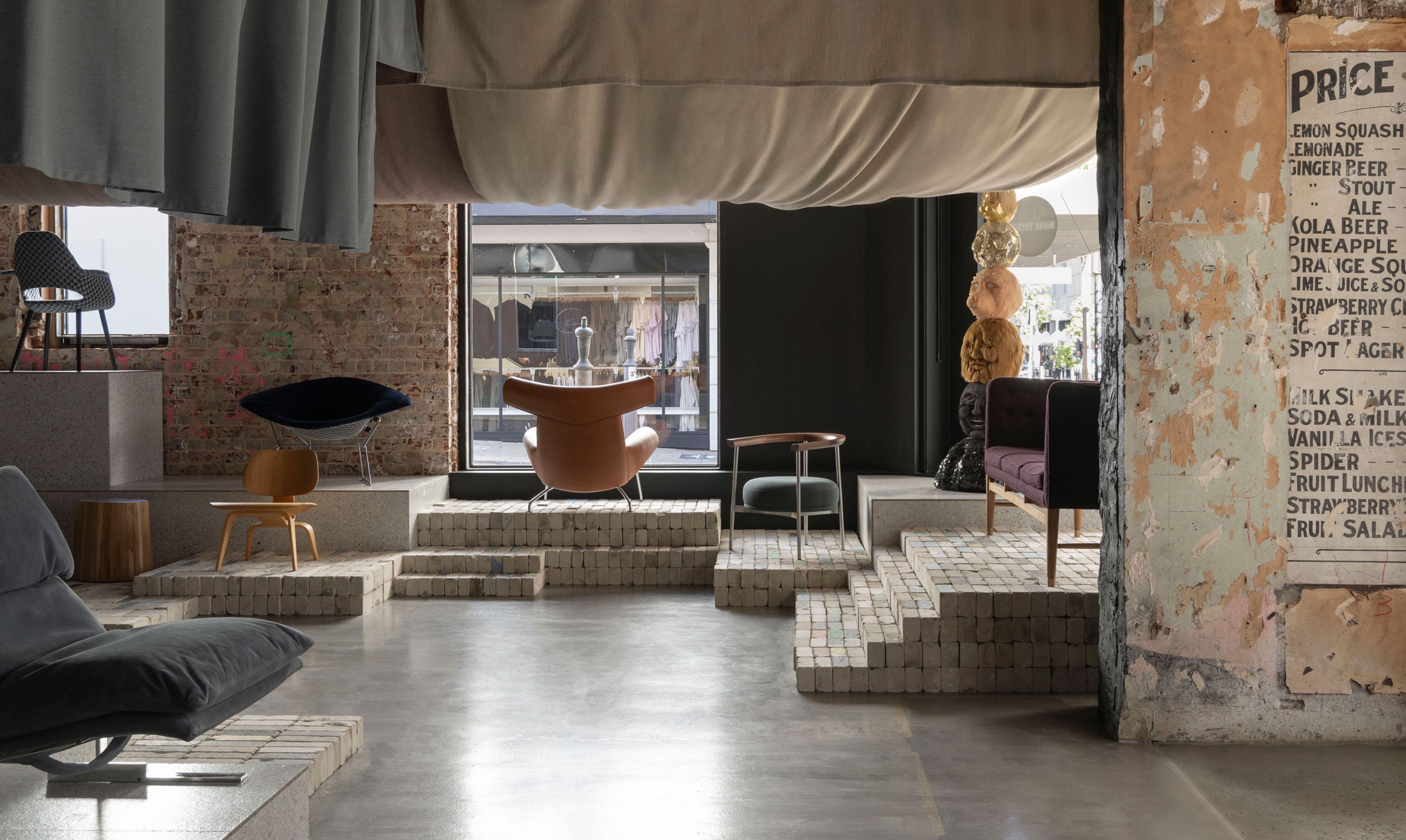 Foolscap's circular retail space for Cultivated and Mark Tuckey. The former car salesroom was adapted using three core elements - recycled bricks, saveBOARD, and existing upholstery fabric, to transform into a 