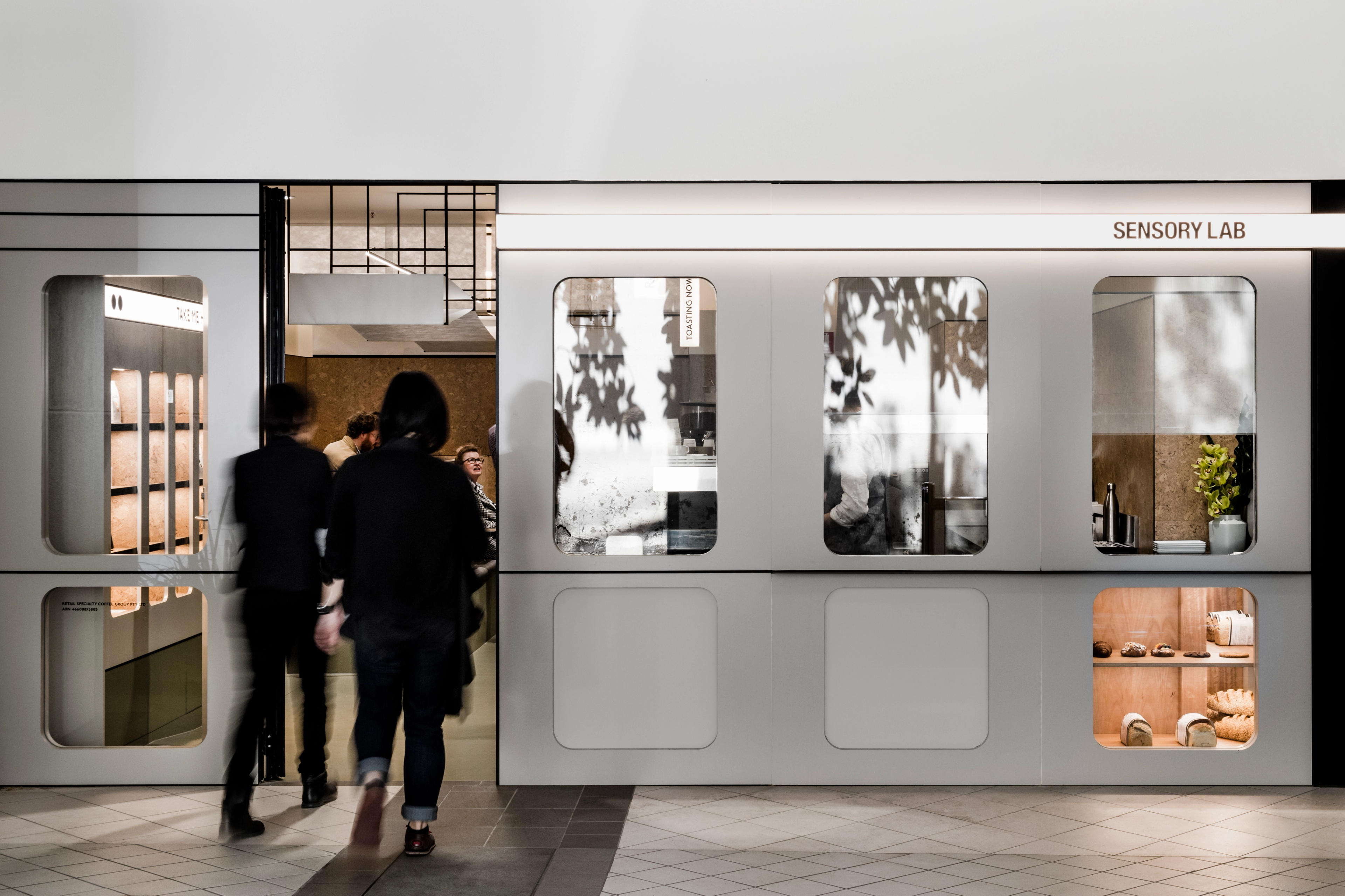 The futuristic facade of specialty coffee cafe Sensory Lab designed by Foolscap on Collins St, Melbourne.