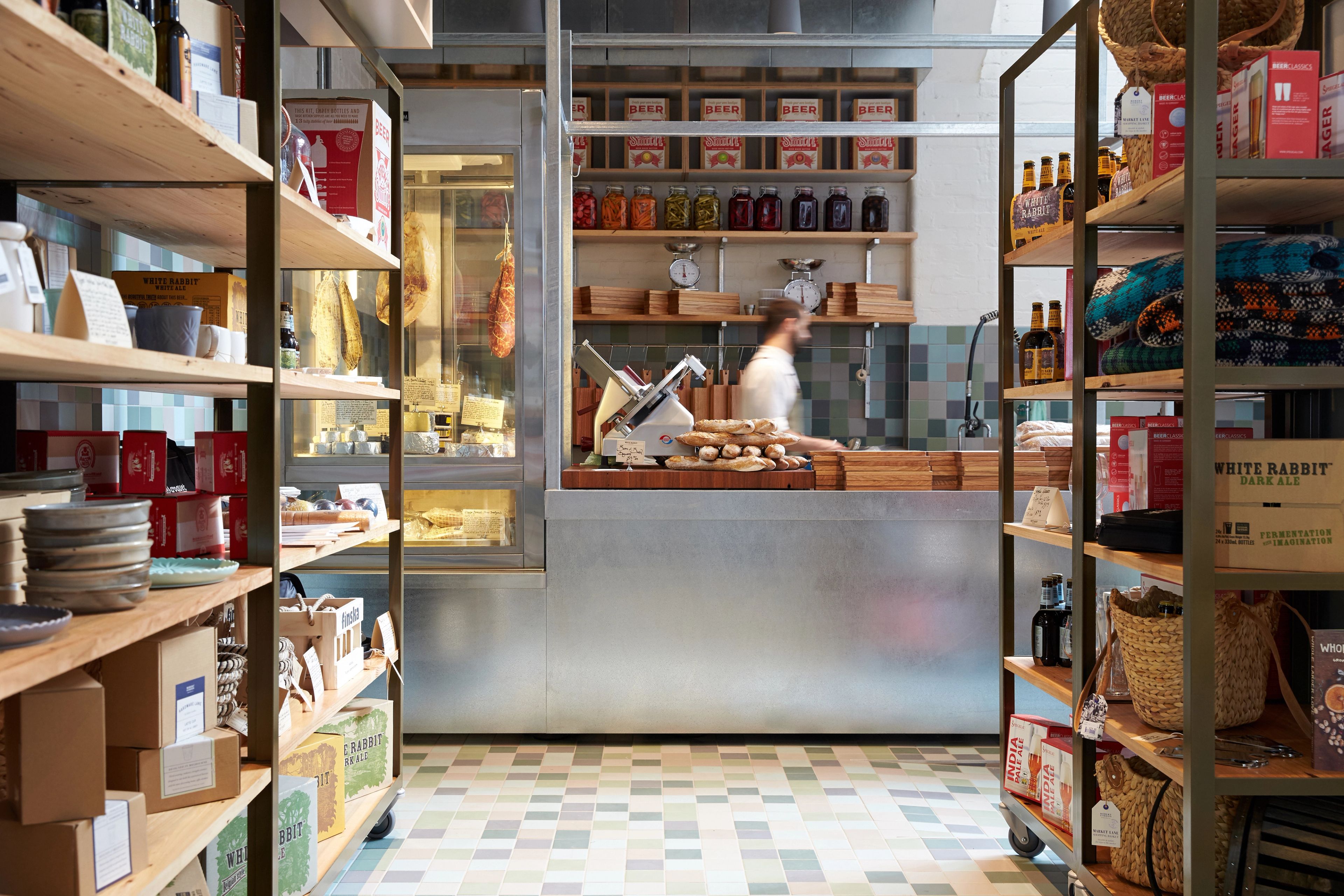 An open bar space with some people seated