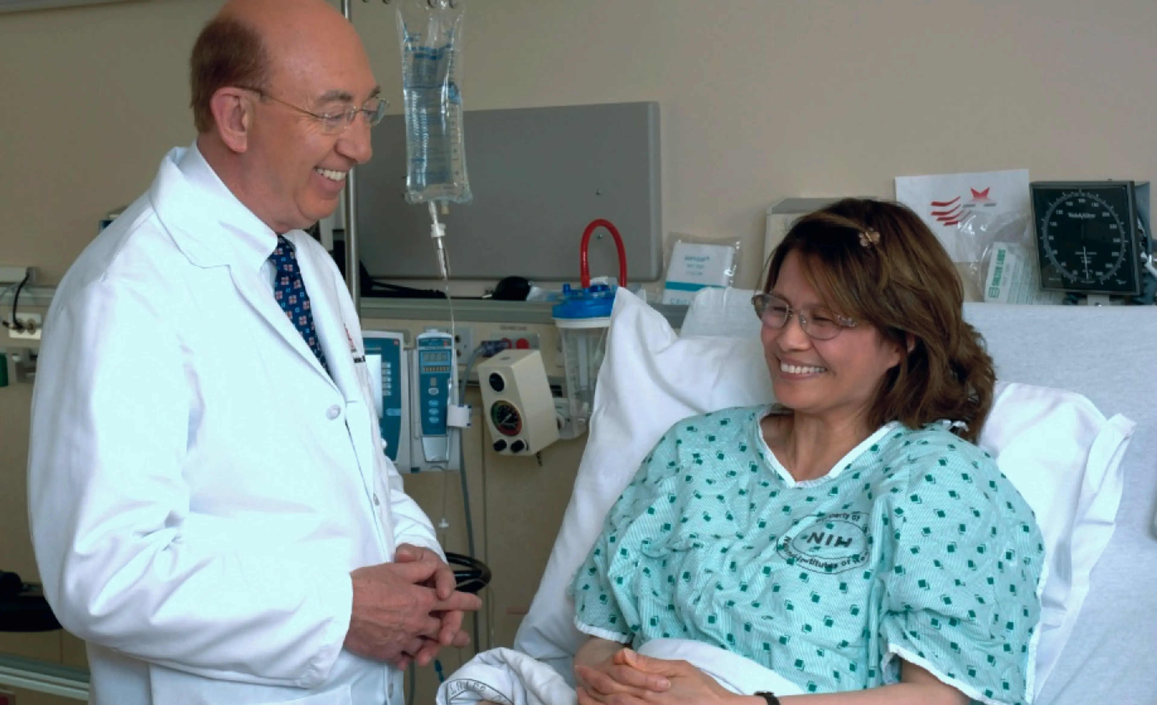 Patient seated comfortably while discussing infusion treatment with doctor