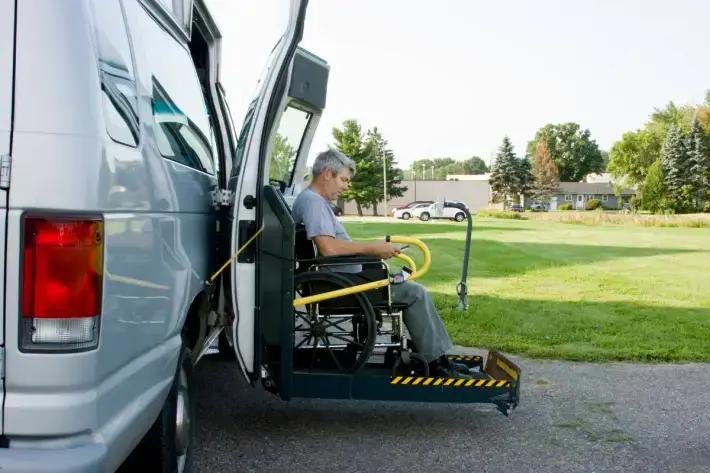 A Patient in a Wheelchair uses our Accessible Van Transportation Services to visit Violet Health Infusion.