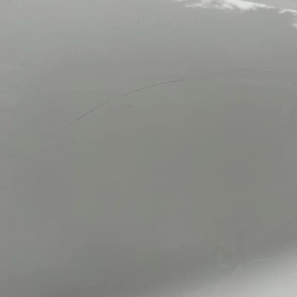 Before — Door Scratch Repair on an MG ZS in Blackburn, Lancashire