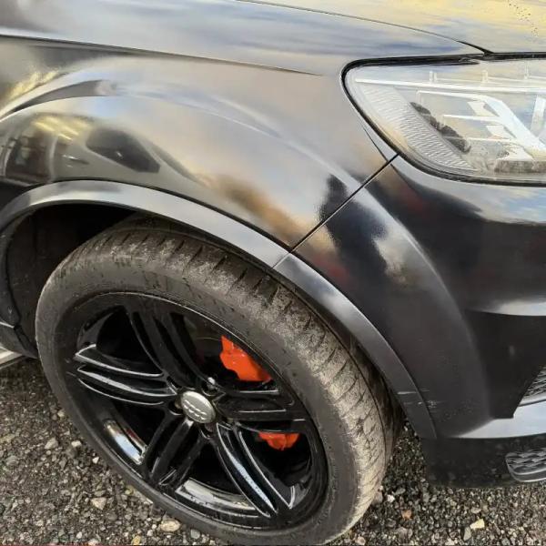 Before — Rectifying poor paintwork on a black Audi Q7 in Wigan