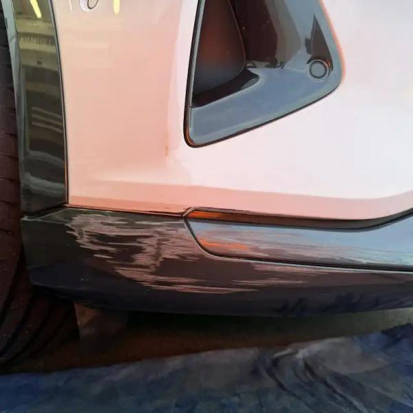 Before — Splitter and bumper scuff repair on an Audi Q8 e-tron in Standish, Wigan