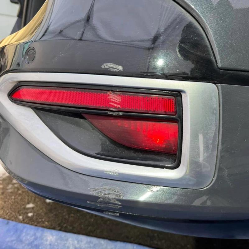 Before - Bumper Corner, Wheel Arch Trim and Door Scratch Repair on Kia Sportage in Standish