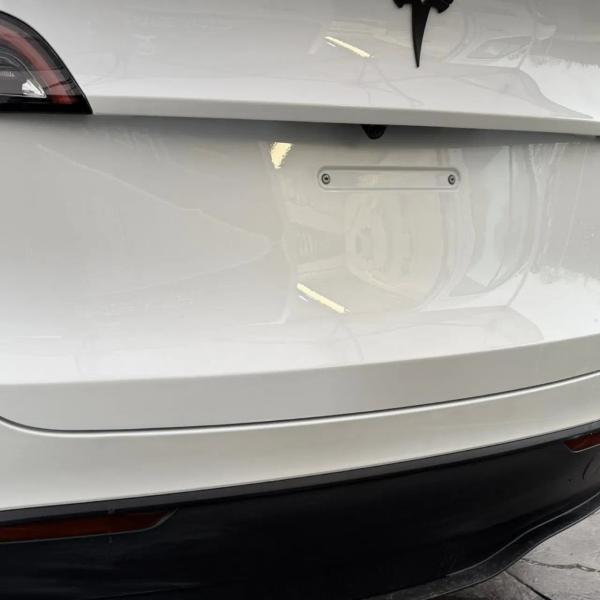 After — Rear bumper and bootlid dent repair on Tesla Model Y in Hindley, Wigan