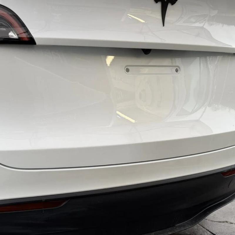 After - Rear bumper and bootlid dent repair on Tesla Model Y in Hindley, Wigan