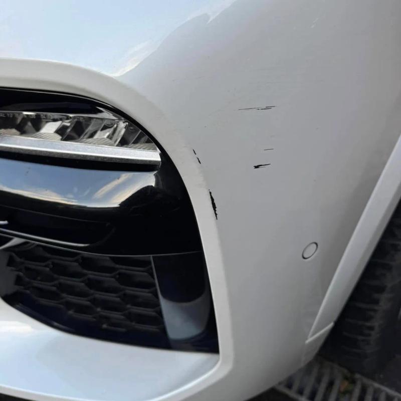 Before - Front Bumper Corner Repair on BMW X5 in Wigan