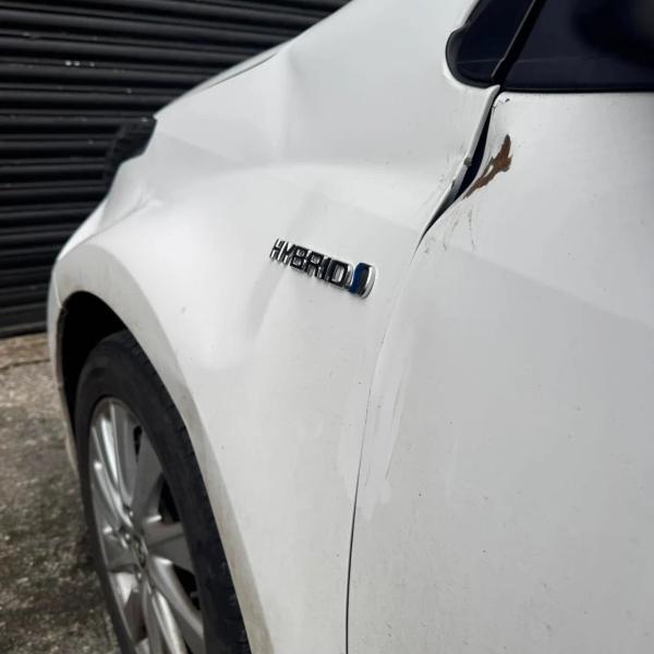 Before — Front Wing Supply, Paint and Fit with Door Repair on Toyota Yaris in Wigan