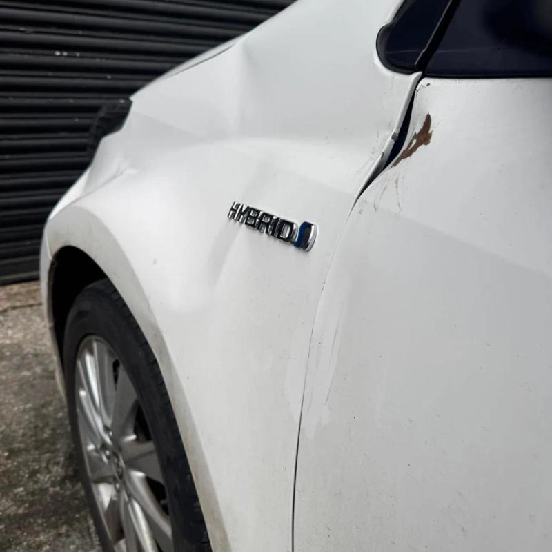 Before - Front Wing Supply, Paint and Fit with Door Repair on Toyota Yaris in Wigan