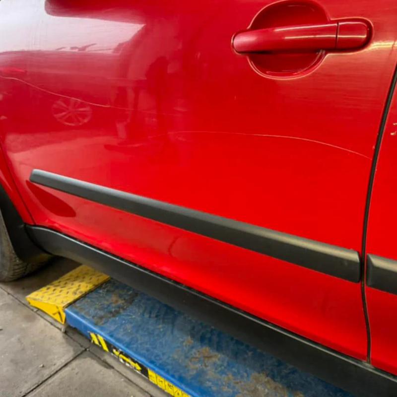 Before - Key Damage Repair Across Passenger Side Panels on a Skoda Yeti in Wigan