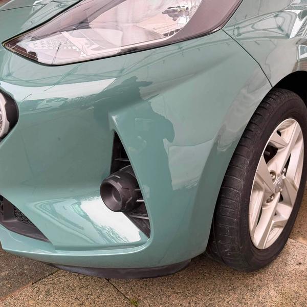 After — Front bumper corner and wing mirror repair on a Hyundai i10 in Wigan