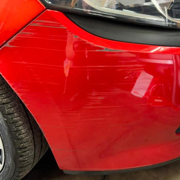 Before — Front Bumper Scratch Repair on a Renault Clio in Wigan
