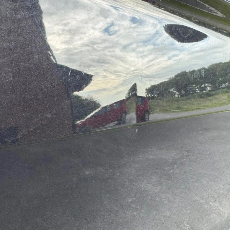 Before - Driver's Door Dent Repair on Volkswagen Tiguan in Southport