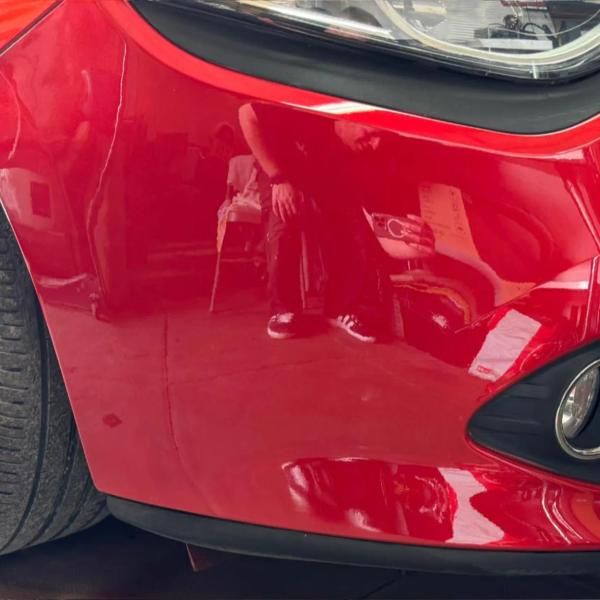After — Front Bumper Scratch Repair on a Renault Clio in Wigan
