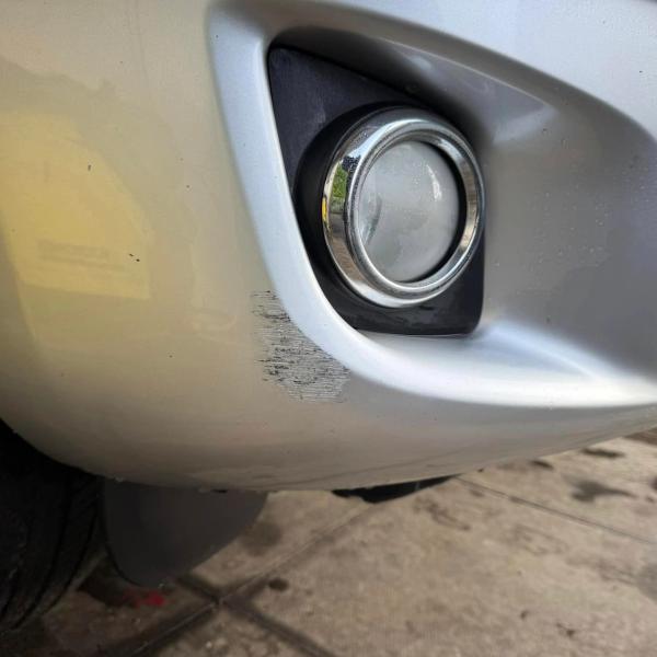 Before — Rear Bumper Scuff and Front Bumper Corner Repair on a Toyota RAV4 in Wigan