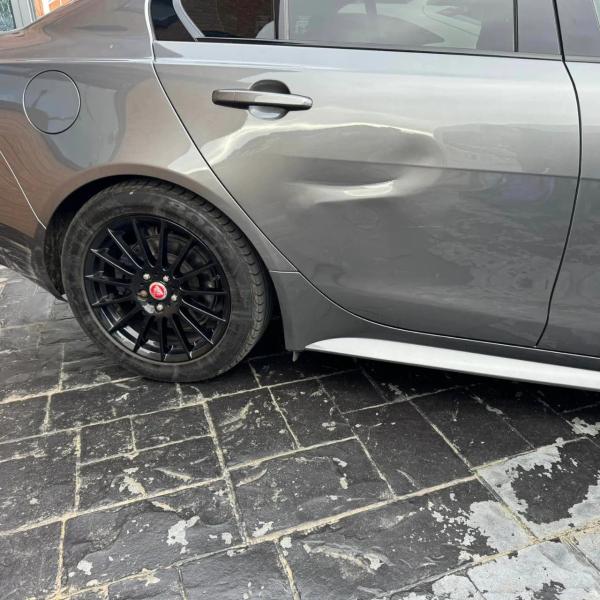 Before — Rear Door Dent and Multi-Panel Blend Repair on a Jaguar XE in Highfield, Wigan