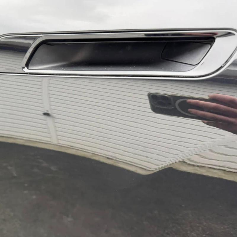 After - Rear Door Dent and Front Bumper Repair on BMW iX in Standish, Wigan