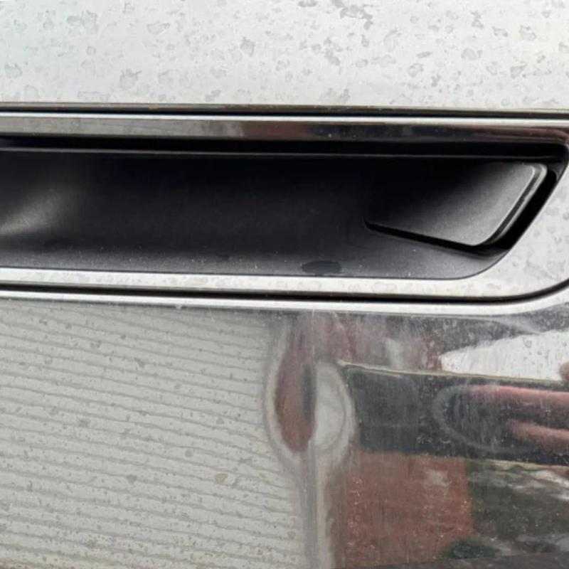 Before - Rear Door Dent and Front Bumper Repair on BMW iX in Standish, Wigan
