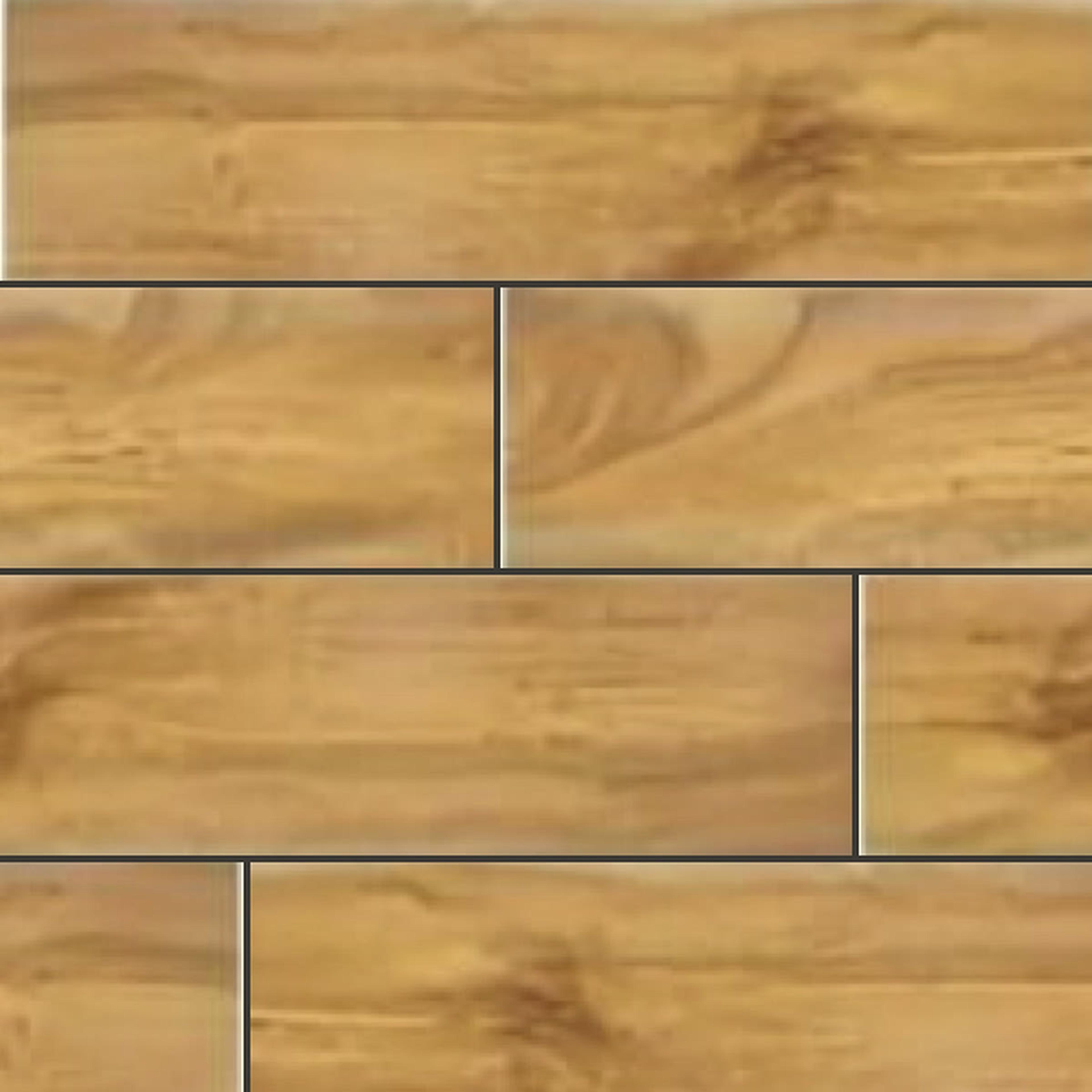 Muestra de porcelanato símil madera teca dorada