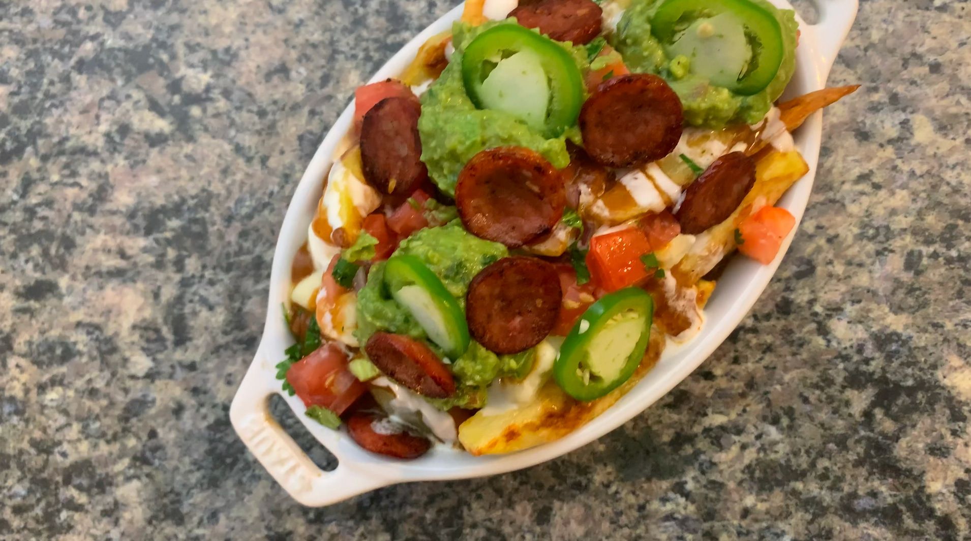 Spice Up Your Meal with this Mexican Fusion Poutine!