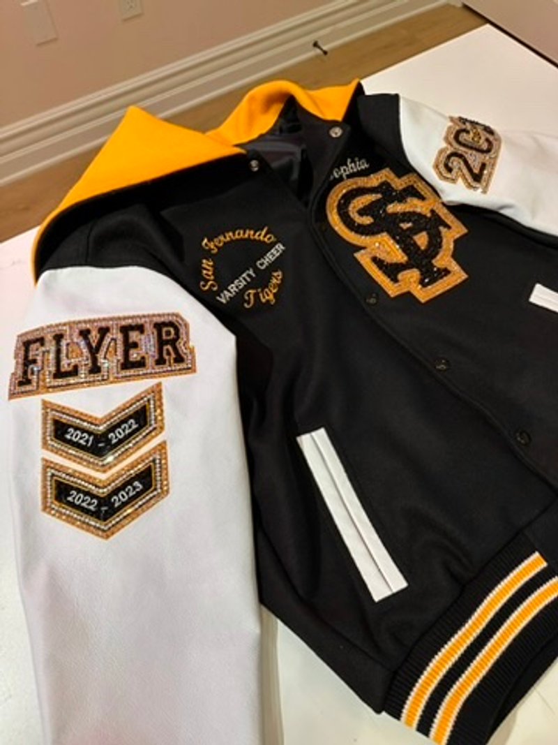Custom blinged letterman jacket by Erica’s Sparkly Designs