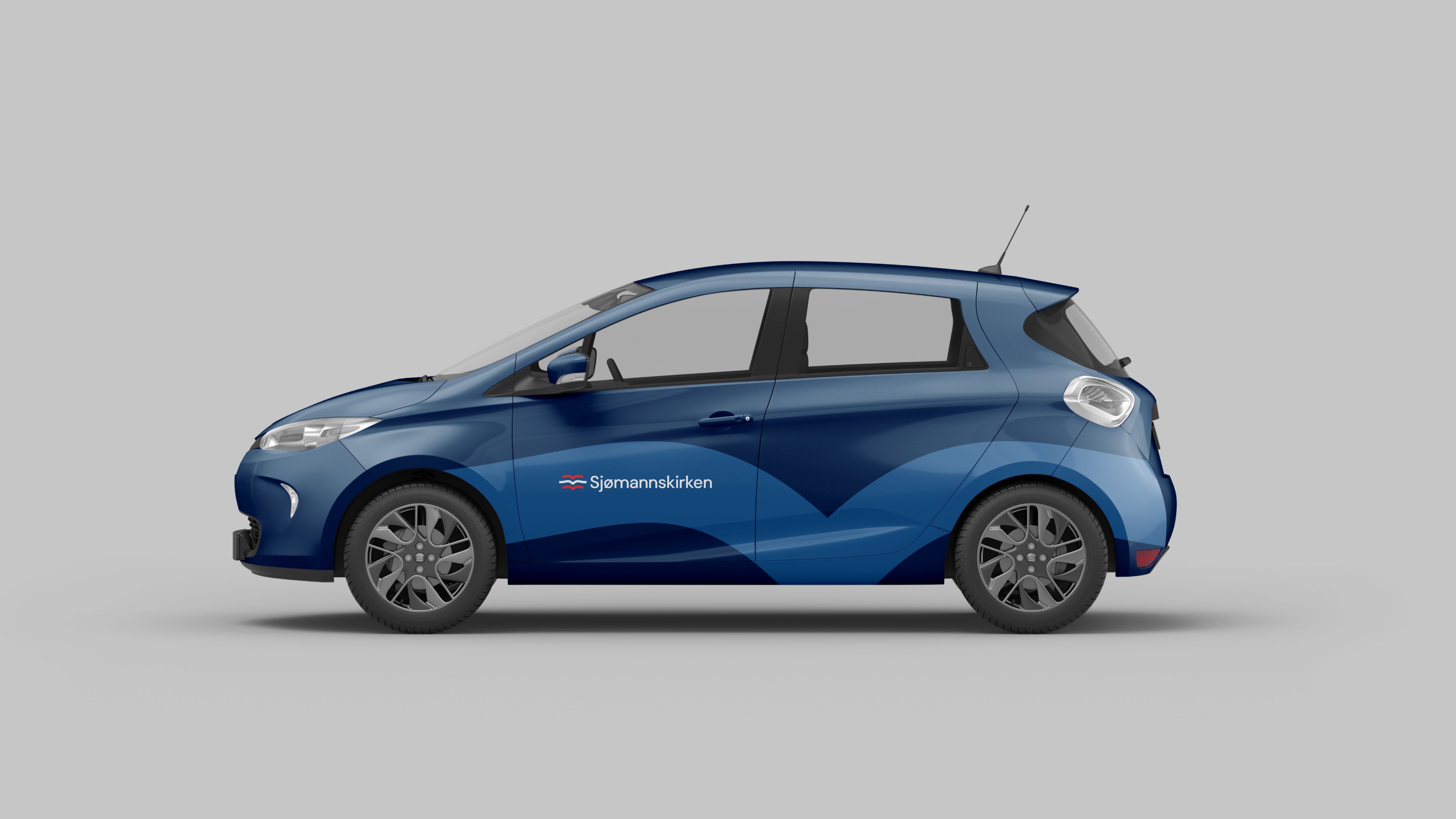 Car with Sjømannskirken blue graphic motive and white logo