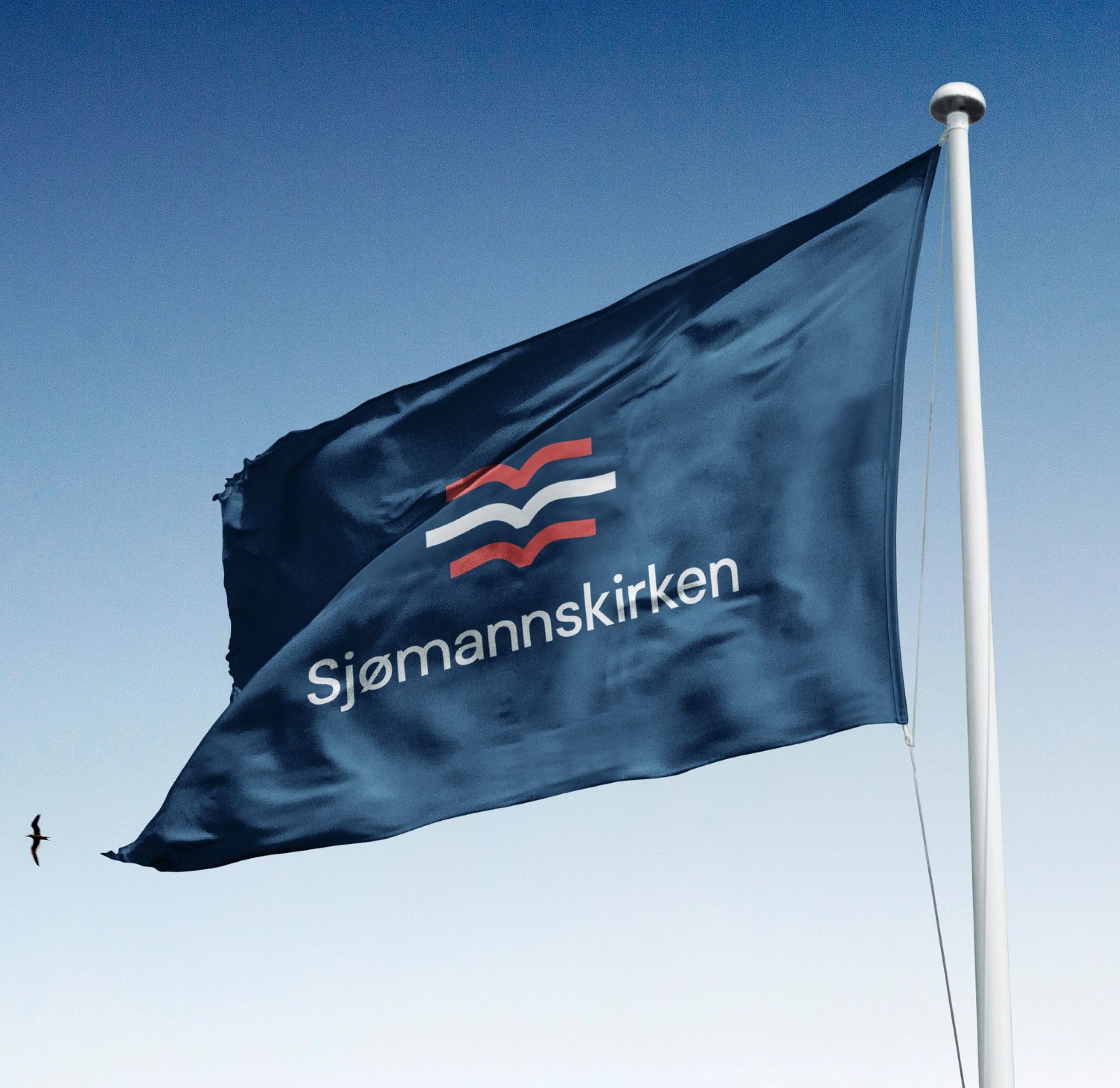 Blue flag with Sjømannskirken logo 