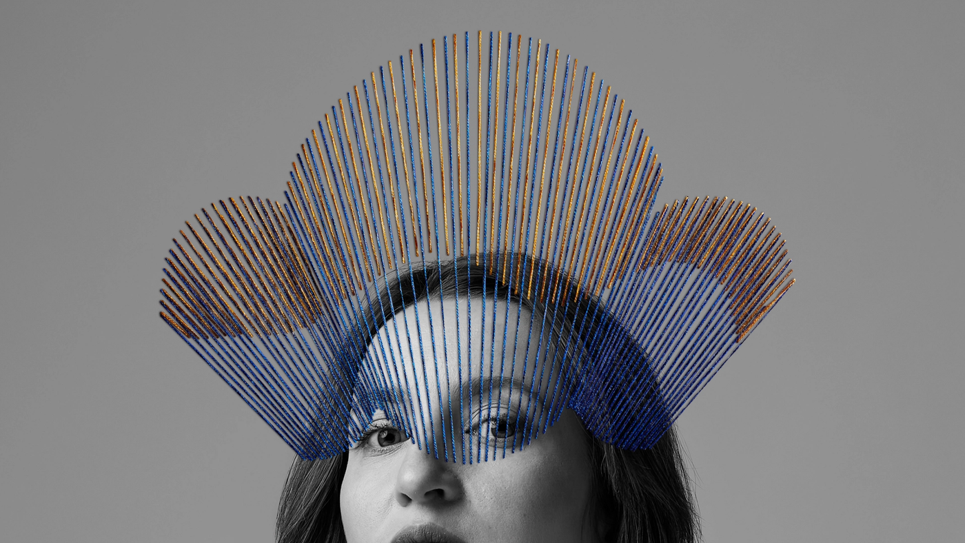 Black and white portrait with a stiched crown