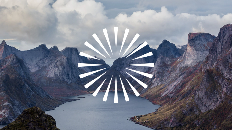 Enova Hero pic mountains with a lake or fjord