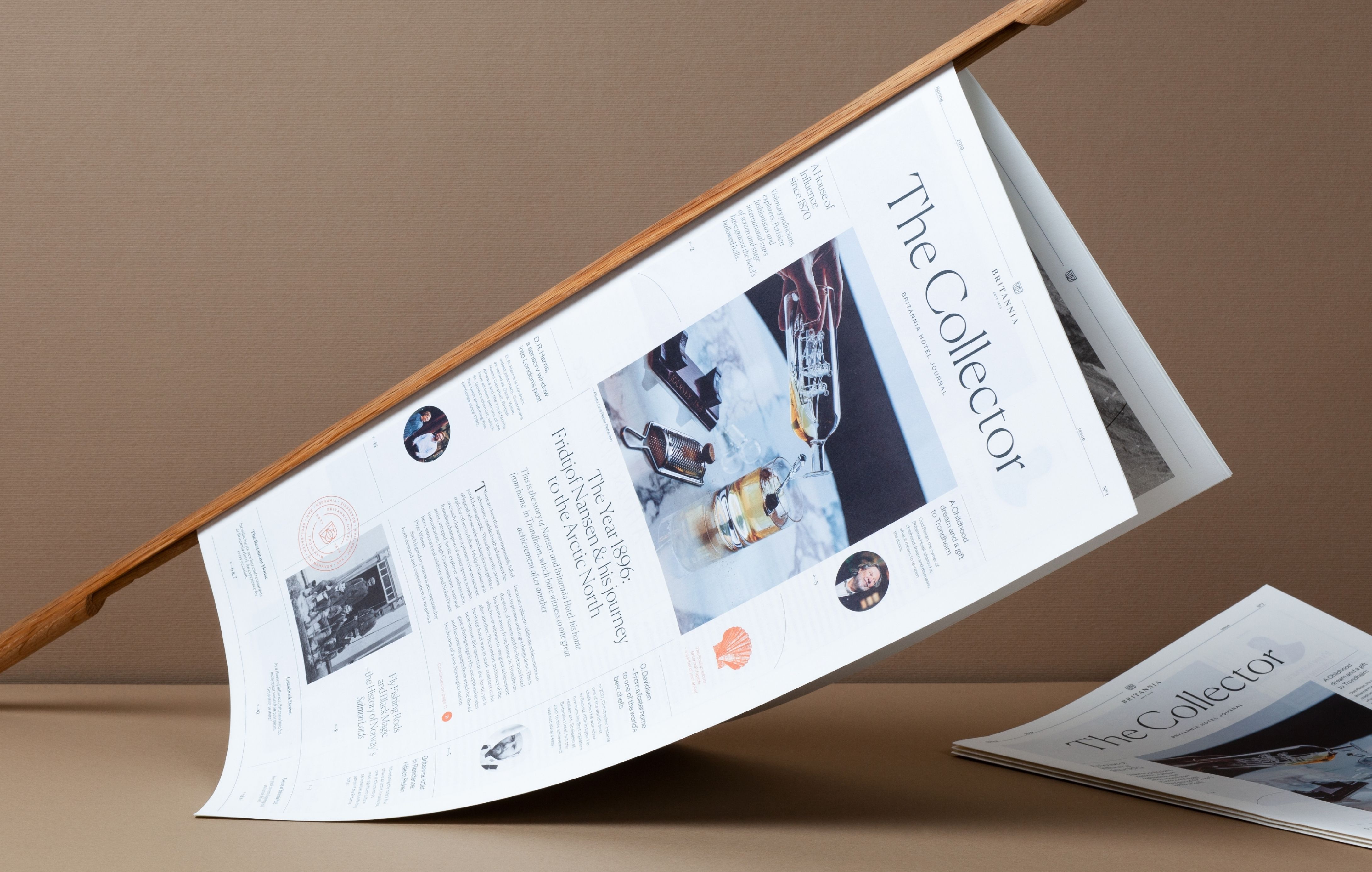 The Collector on a newspaper stick