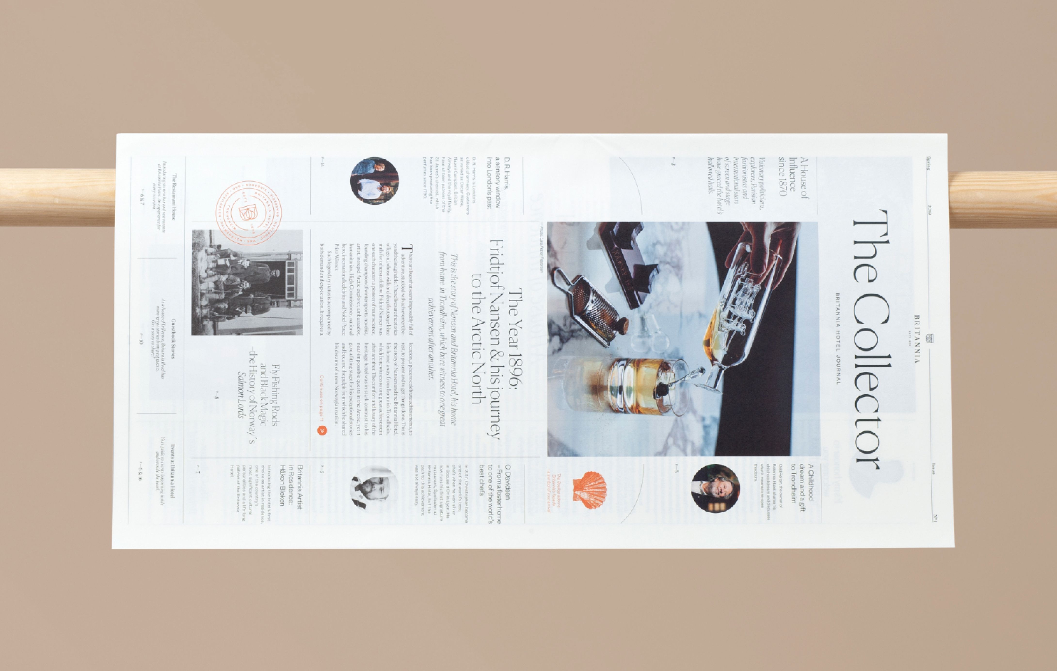 The Collector newspaper hangin over a wooden stick