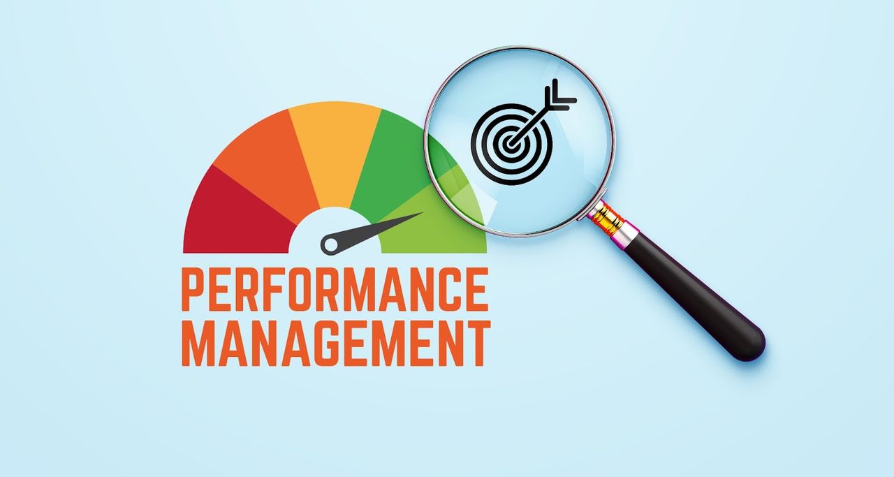 Performance management gauge with magnifying glass.