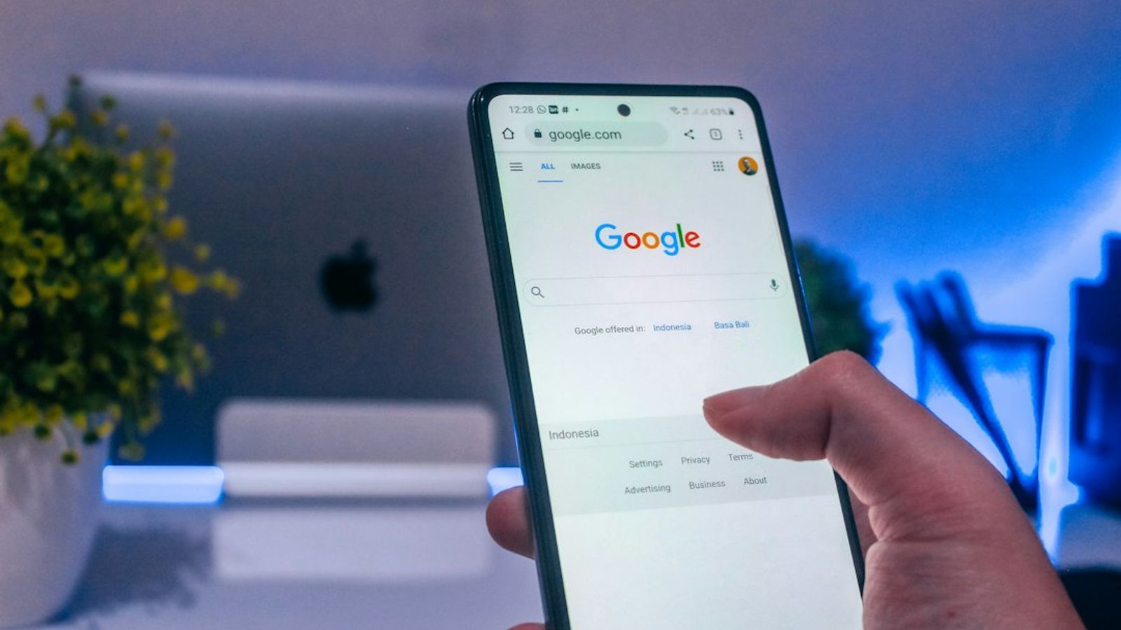A homeowner searching for a service on Google from a phone.