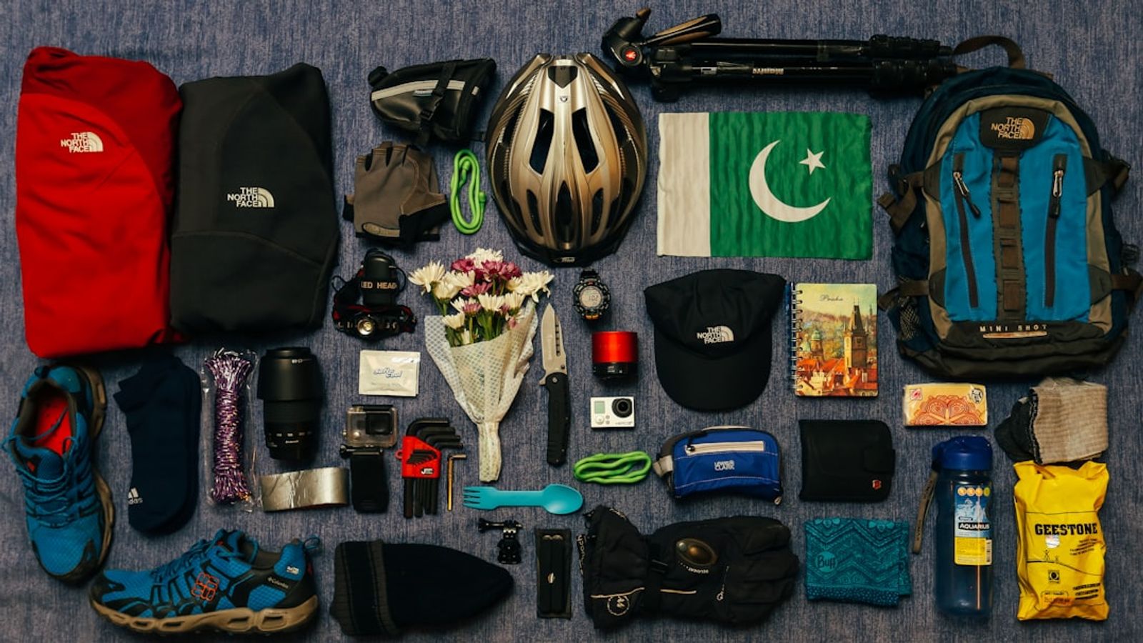 A rucksack load-out laid out — preparation is the costed judgment of what to carry