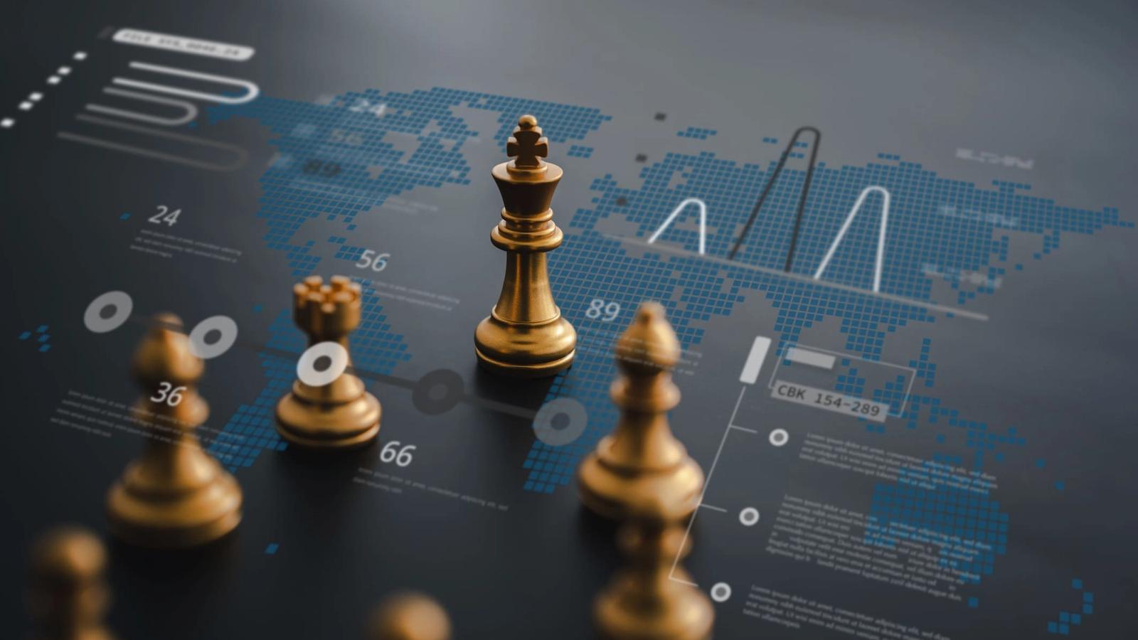 A chessboard with golden chess pieces is placed on top of a digital world map with data visualizations, charts, and graphs. The king piece is the focus in the center, symbolizing strategic decision-making and global analytics—a true business wargame unfolding before your eyes.