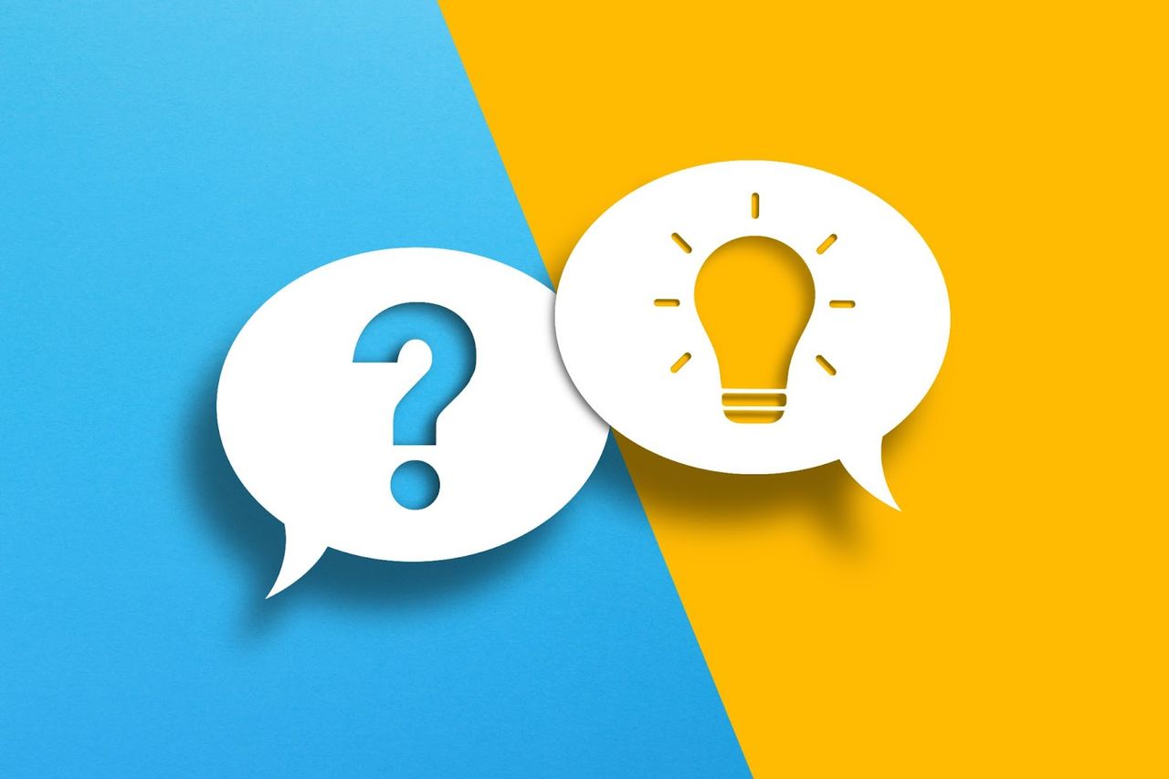 Question and idea speech bubbles on colorful background.
