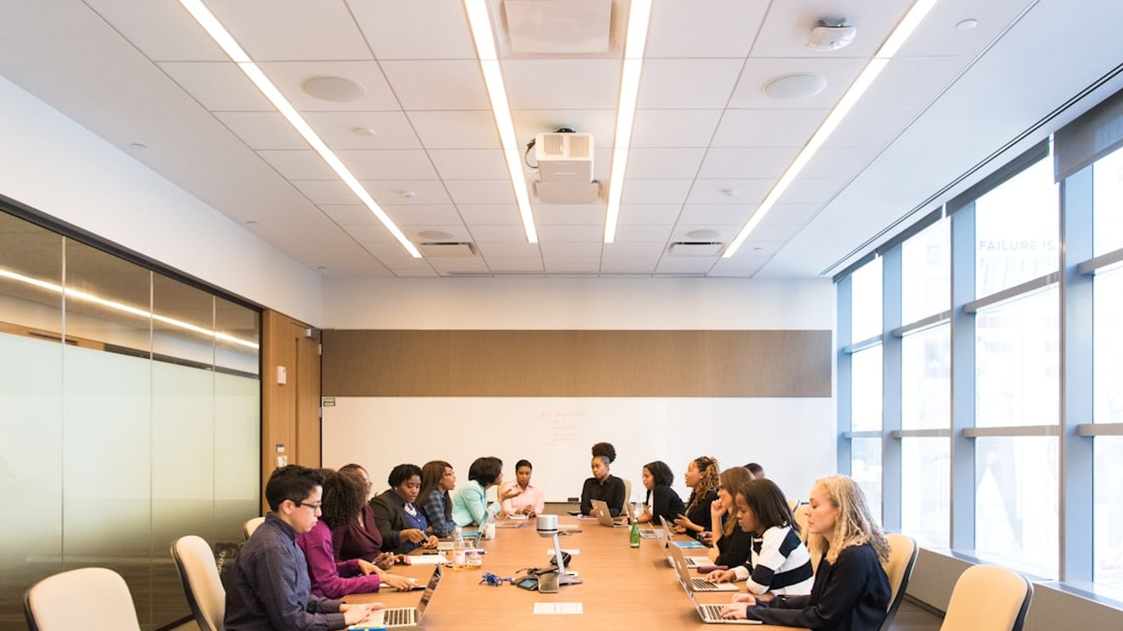 A leadership team in a strategy session around a conference table