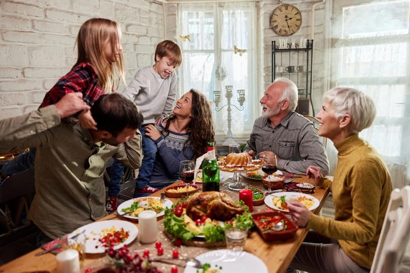 Multi-generational family enjoying festive dinner together