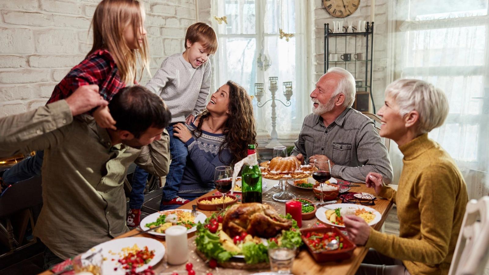 Multi-generational family enjoying festive dinner together