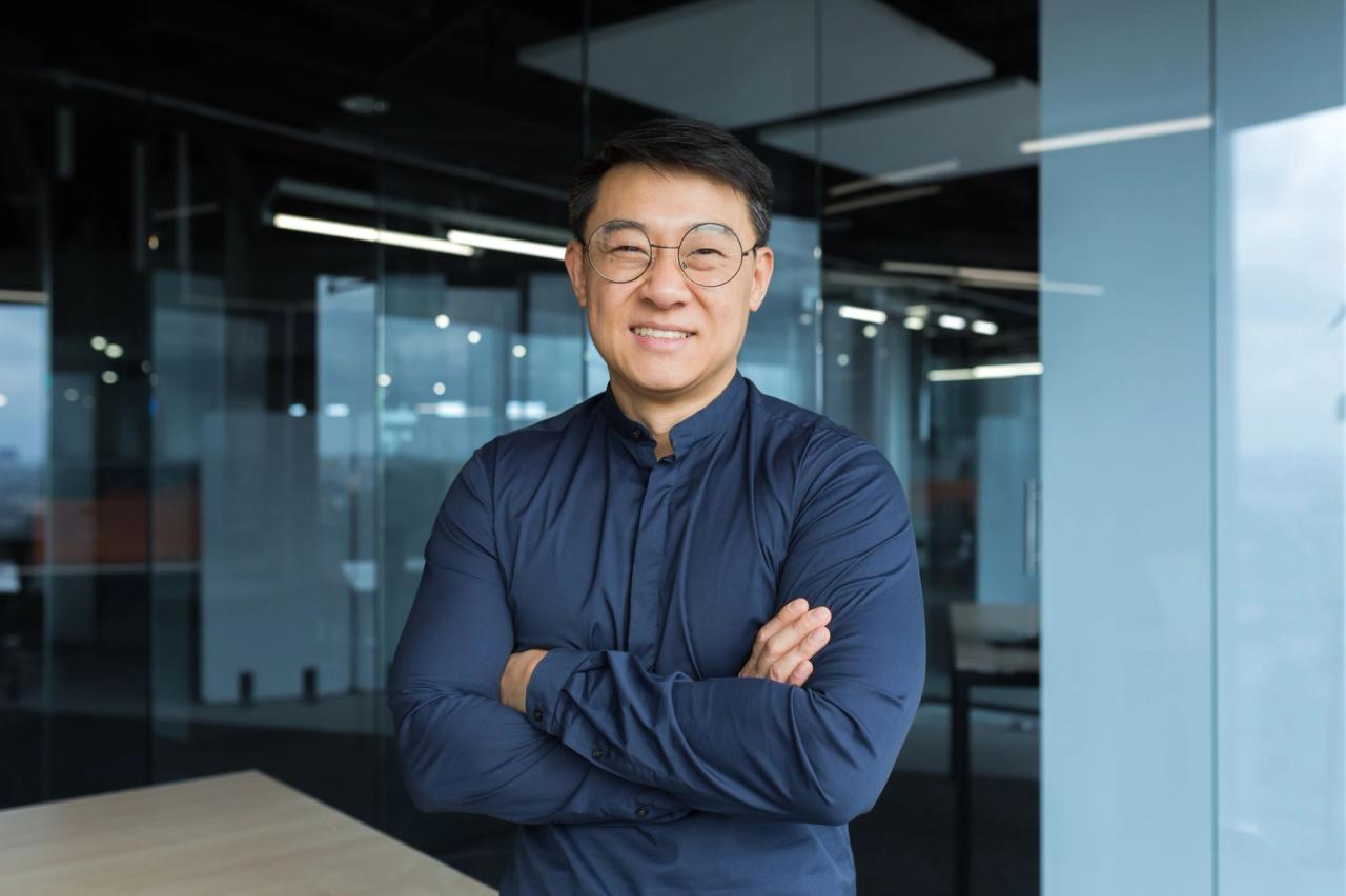 Smiling professional man in modern office setting