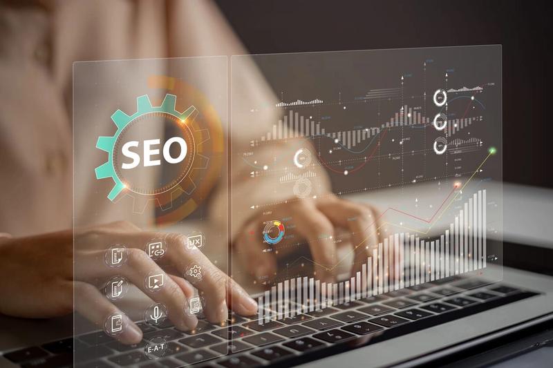 Person using SEO interface on laptop