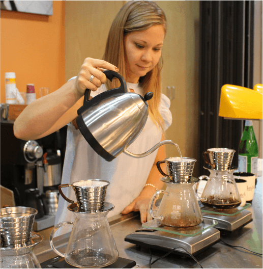 Holly Perry pouring water out of kettle