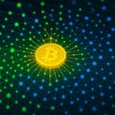 A glowing Bitcoin symbol surrounded by a network