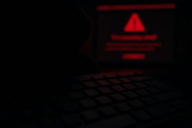 A dimly lit scene featuring a keyboard in the